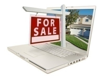 Red For Sale Sign on Laptop