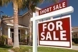 Short Sale Home For Sale Real Estate Sign and House - Right Side.
