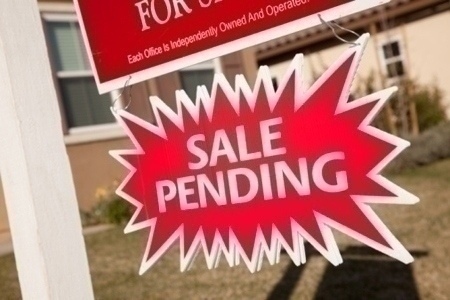 Red Sale Pending Real Estate Burst Sign.