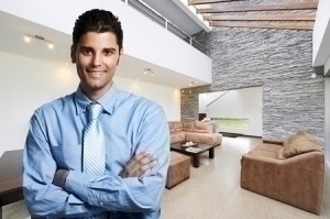 Young successful business man at home