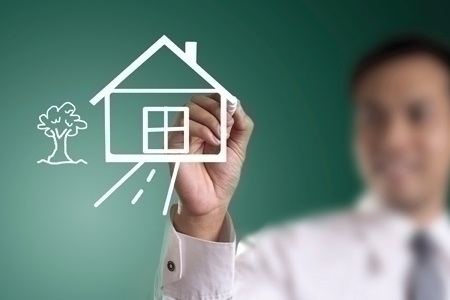 hand drawing house in a whiteboard