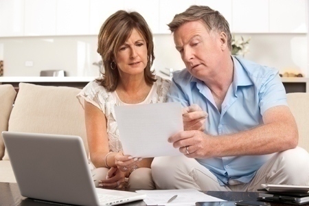 Mature couple worrying about finances