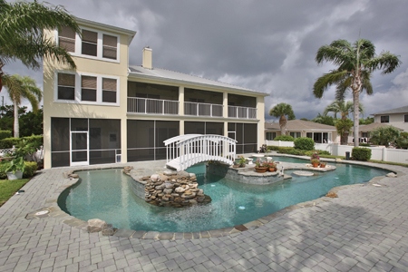 Great Spaces: Prime Riverfront Florida Estate with a Lazy River Pool
