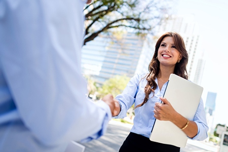 Business woman handshaking