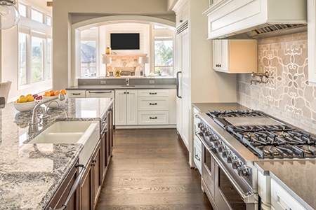 Beautiful Kitchen in Luxury Home. View of Living Room.