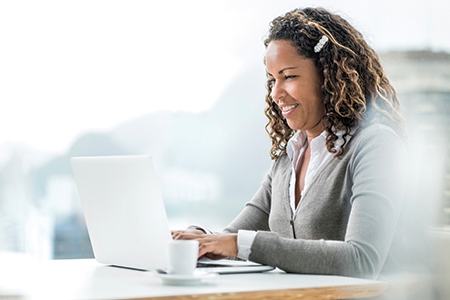 African American businesswoman using computer.