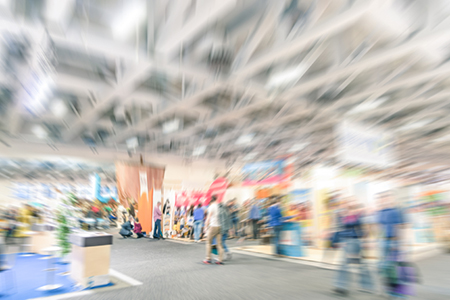 Generic trade show stand with blurred zoom defocusing - Concept