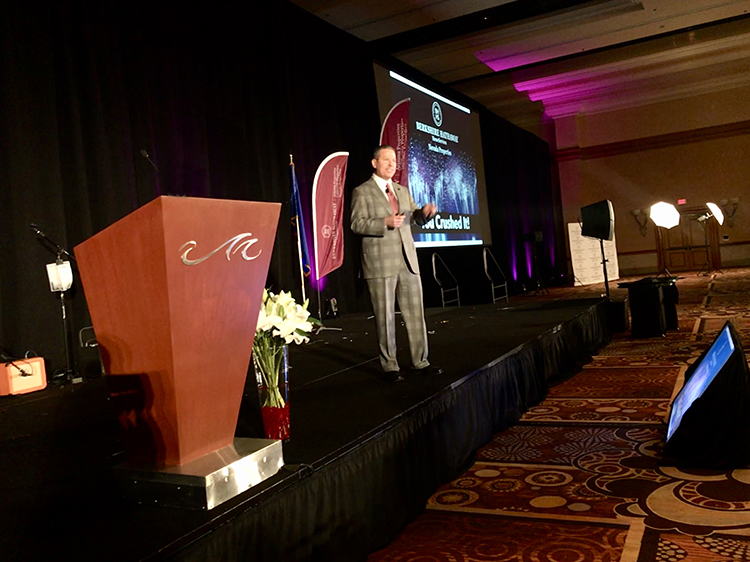 Americana Holdings CEO Mark Stark addresses attendees of the Berkshire Hathaway HomeServices Nevada Properties annual event.