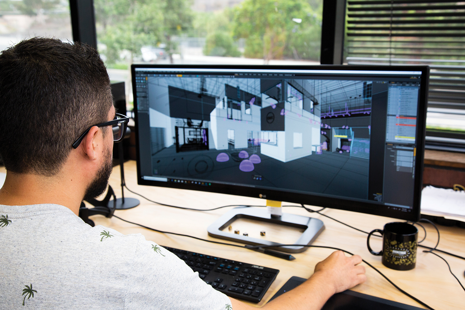 Internal 3D designer Juan Sosa designing Realty ONE Group's new headquarters in Laguna Nigel.