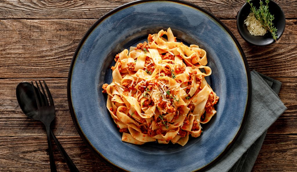 Pasta bolognese. Traditional italian dish of pasta with tomato and meat mince sauce served in a