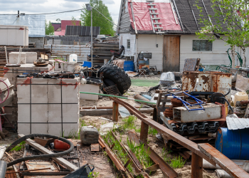 Real Estate Q&A: What Can Neighbors Do About Hoarder’s Unkempt Home?