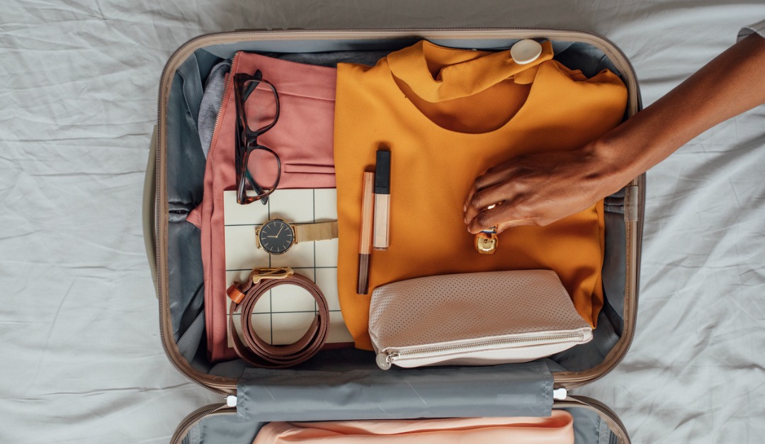 https://www.rismedia.com/wp-content/uploads/2022/03/woman-packing-her-clothes-in-a-suitcase-picture-id1304857766.jpg