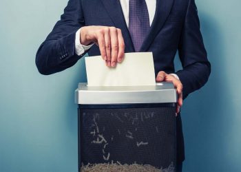 Berkshire Hathaway HomeServices Florida Holding Shredding for Charity Event