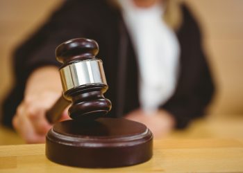 Judges Deny Lawsuit Consolidation Effort, Leaving Commission Cases Scattered