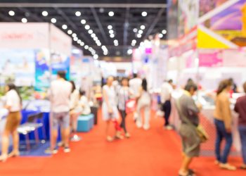 Abstract blurred event exhibition with people background, business convention show concept.