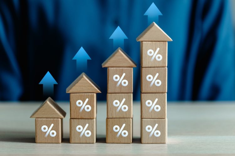 Businessman planning tax income and investment real estate return income, Home loan Interest rate concept, return, retirement, dividend yield, Inflation rate, financial and investment.