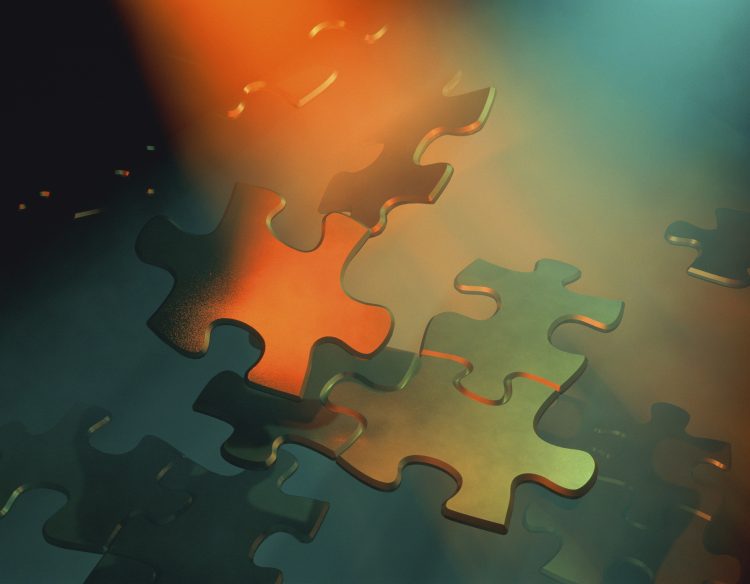 Jigsaw pieces floating.